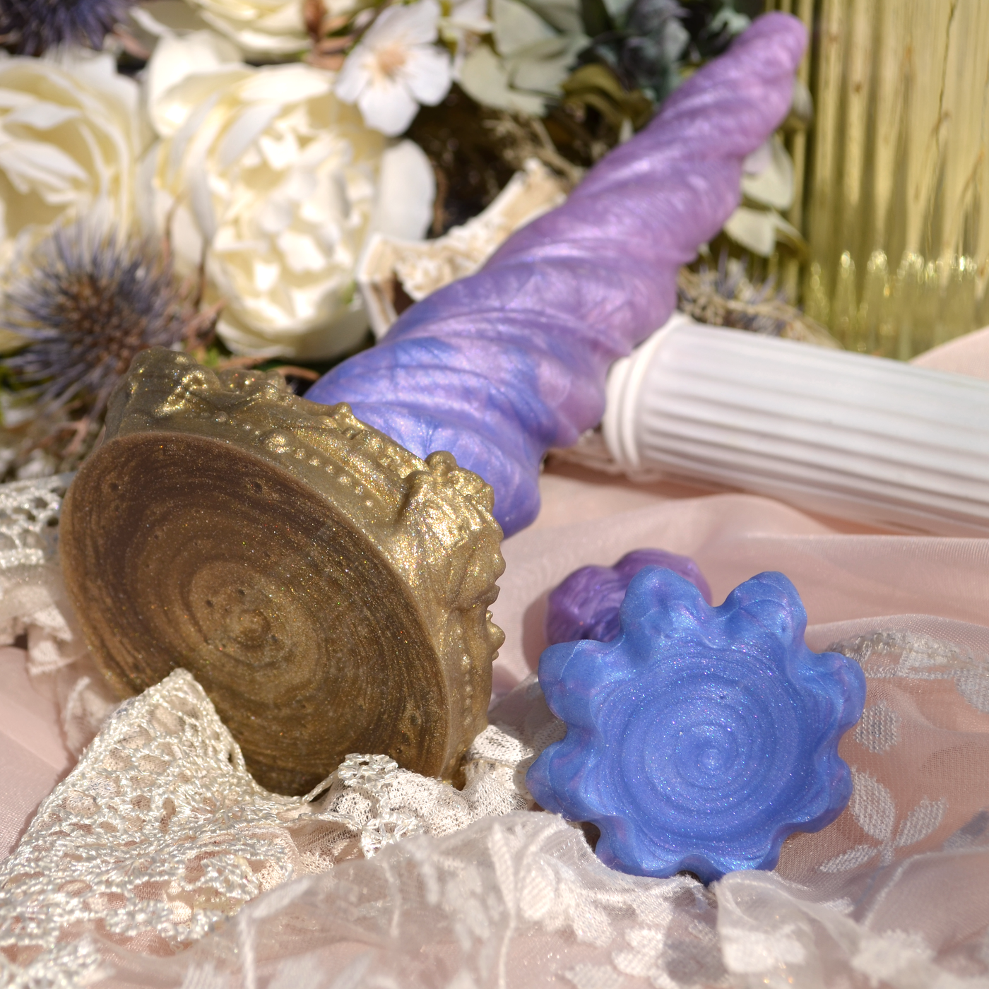 Base du Nymf Plug de Fera Daemon. Partie visible lors du port du plug : un tourbillon féérique de silicone nacré.