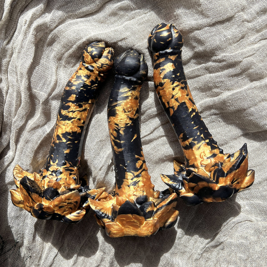 Silicone marbling comparison with 3 Fera Daemon dildos with gold and black marble effect